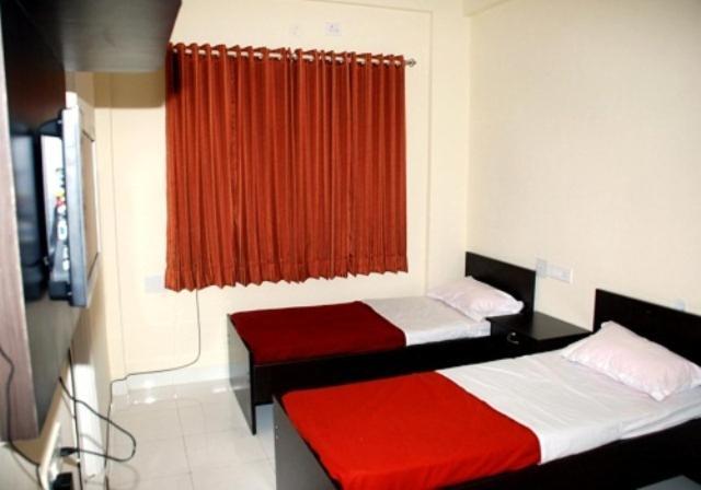 Maple Inn Budget Hotel บังกาลอร์ ห้อง รูปภาพ